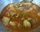 A picture of step 10 of Masala chicken.