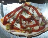 A picture of step 6 of Capsicum onion pizza.
