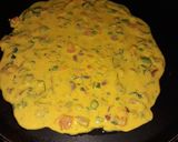 A picture of step 4 of Besan chilla.