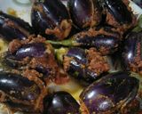 A picture of step 6 of Stuff eggplant with potato.