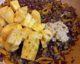 A picture of step 4 of Pollo con Piña y Berenjena.
