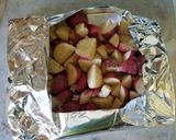 A picture of step 4 of Rosemary & Garlic Red skin potatos.