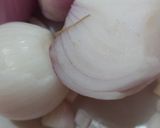 A picture of step 3 of Raw mango stuffed bittergourd.