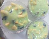 A picture of step 2 of Pista fruit custard orange jelly with black currant sauce.
