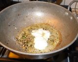 A picture of step 3 of Niramish Doi Begun (Brinjal masala curry).