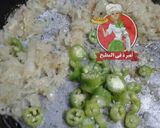 صورة لخطوة 2 من وصفة طريقه جديده لعمل البطاطس مسقعه بطاطس