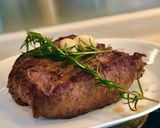 A picture of step 6 of Slow Cook Rib Eye - medium rare.
