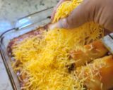 A picture of step 10 of Bourbon barbecue chicken lasagna roll ups.