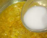 A picture of step 2 of Orange Jelly Pudding Layer in a Glass.