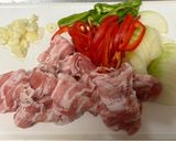A picture of step 1 of Pork Belly and Vegetables Fry with much Peppers.