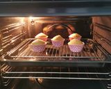 A picture of step 5 of Blueberries and vanilla frosted cup cakes.
