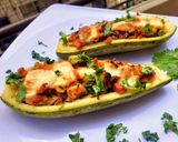Foto del paso 5 de la receta: Zucchine ripiene di pollo,verdure e formaggio-Zucchini relleno de vegetales Pollo y Queso
