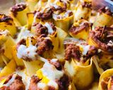 Une image de l'étape 8 de Petits rouleaux de lasagne en gratin.