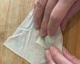 A picture of step 9 of Thai minced pork spring rolls.