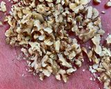 A picture of step 1 of Spicy Walnuts on Greek Salad Parfait.