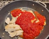 Foto del paso 7 de la receta: Merluza en salsa de tomate y verduras con queso