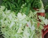 A picture of step 2 of Vegetables egg fried rice.
