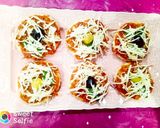 صورة لخطوة 5 من وصفة ميني بيتزا 🍕