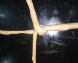 A picture of step 5 of Braided egg buns.