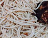 A picture of step 1 of Parmigiana with herbed spaghetti.