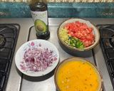 A picture of step 2 of Mexican Sunrise: Eggs with Serrano Pepper, Red Onion, and Tomato.