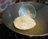 A picture of step 13 of Dal puri.