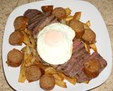 Foto del paso 5 de la receta: Chorrillana de carne asada y chorizo casero