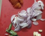 A picture of step 2 of Egg tawa pulav.
