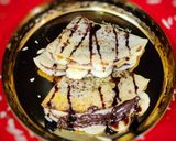 A picture of step 4 of Dosa with Chocolatey Nutella and ripe banana filling.