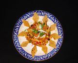 A picture of step 5 of Mexican Bhel with Leftover Roti Nachos.