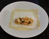 A picture of step 14 of Chicken Parmesan Eggrolls.