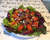 Une image de l'étape 10 de Salade de laitue frisée, trévise et tomate cœur de bœuf.
