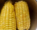 A picture of step 2 of CHEESY BUTTERI CORN on COB.