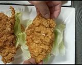 A picture of step 6 of Crisp fry chicken burgers 👌😋.