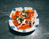 Hình bước làm 3 của món Mực xào cà chua & hành tây