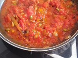 Pasta in spicy chorizo tomato sauce with capers