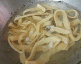 A picture of step 3 of Homemade Fettuccine pasta with arebita source.