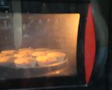 A picture of step 5 of Christmas special vanilla tutti fruti cup cakes.
