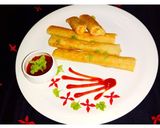 A picture of step 10 of Veg cheese paneer cigar.