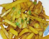 A picture of step 6 of Indian Garlic Potatoes.