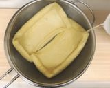 A picture of step 1 of Boiled deep-fried tofu and Komatsuna.