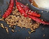 A picture of step 1 of Poondu milagu kulambu.