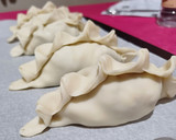 Foto del paso 4 de la receta: Empanadas de sardina con champiñones, cebolla caramelizada y huevo