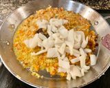 Foto del paso 7 de la receta: Arroz con marisco y manzanilla