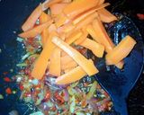 A picture of step 12 of Dambu shinkafa with veg.sauce.