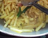 A picture of step 1 of Potato onion fry.