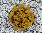 A picture of step 6 of Mexican nachos salad.