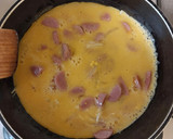 Foto del paso 2 de la receta: Huevo revuelto con mostaza y salchicha