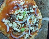 A picture of step 8 of Cauliflower crust pizza-gluten free.