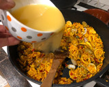 Foto del paso 6 de la receta: Arroz con cuerpos de centollo o cangrejo, cigalas, almejas y calamar